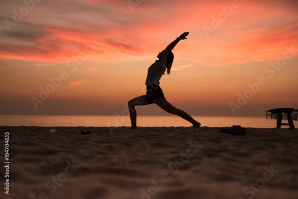 Obraz Yoga in the sunset beach