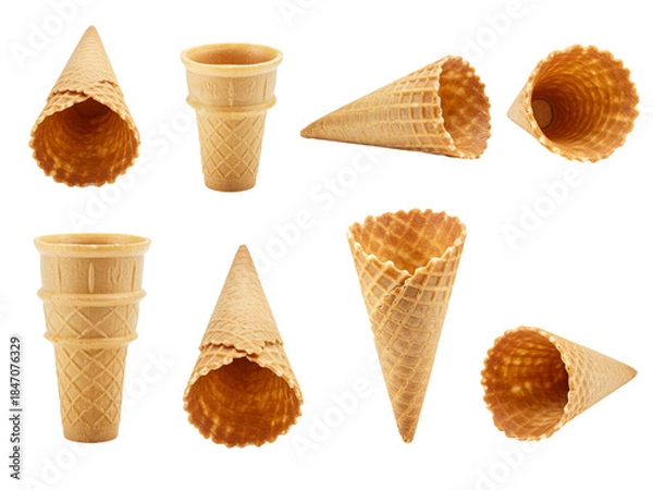 Fototapeta Ice cream cones with vanilla and chocolate scoops on a waffle cone isolated on white background