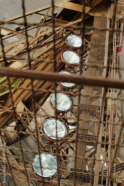 Obraz Industrial Light Beneath the Eiffel Tower