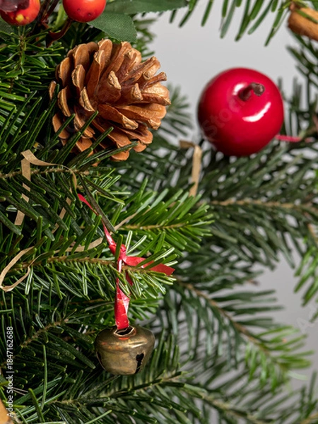 Fototapeta natural spruce branches decorated with pine cones