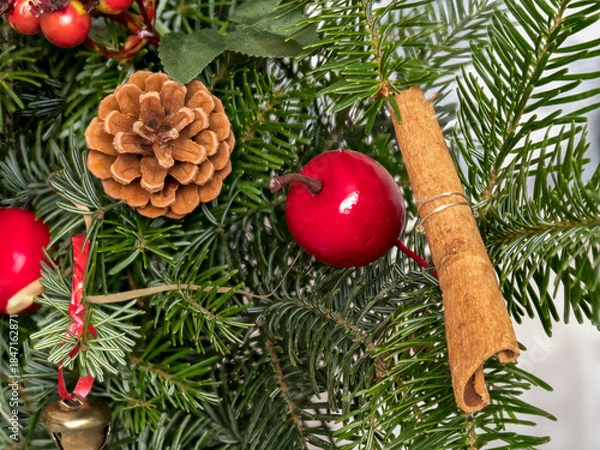 Obraz natural spruce branches decorated with pine cones