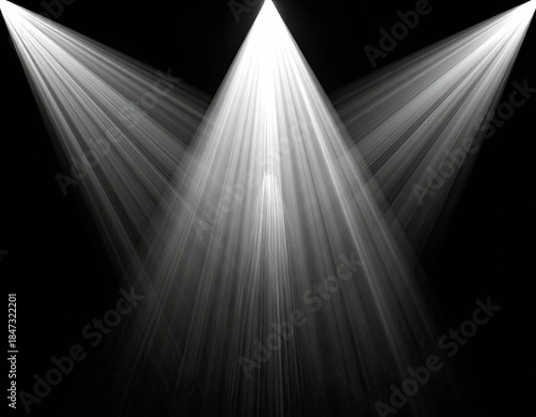 Obraz Three bright spotlights shining down, creating a light ray pattern