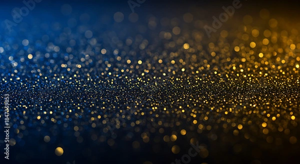 Obraz Golden glittering particles on dark blue background