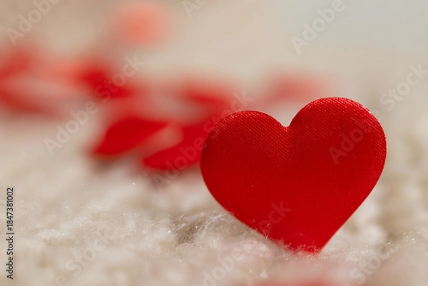 Obraz Small red fabric hearts scattered on the soft white surface create a romantic atmosphere, perfect for digital Valentine's Day content.