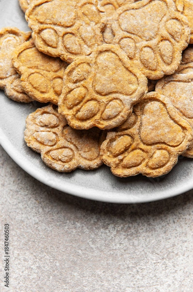 Obraz Homemade paw print dog treats on a plate