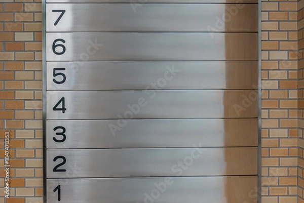 Fototapeta ビルの各階を示すフロア案内プレートのイメージ