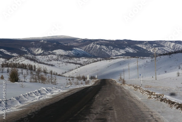 Obraz Icy mountain road through snowy forest hills