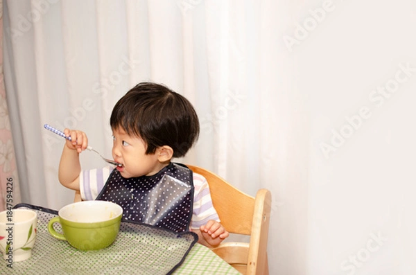 Obraz 食事中の子供
