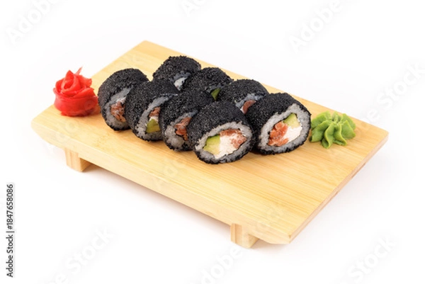 Obraz Sushi rolls arranged elegantly on a wooden plate