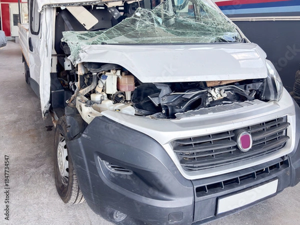 Obraz Front View of a Damaged White Van After a Fatal Traffic Accident