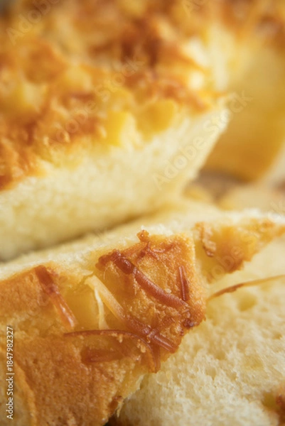 Obraz Golden Crust Bread with Embedded Cheese Close-Up