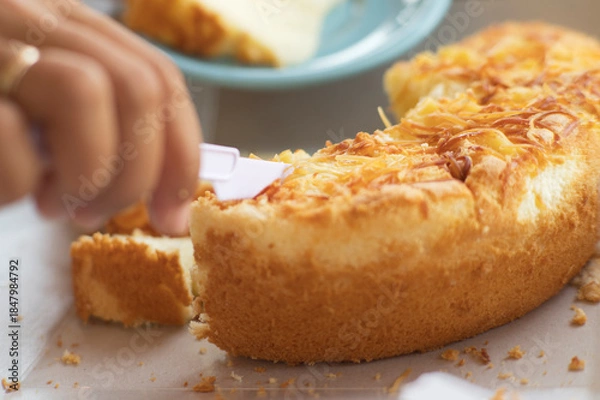 Obraz Serving Savory Cake on Blue Plate Background