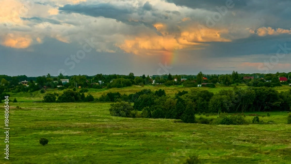 Fototapeta Hills with meadows and forests.