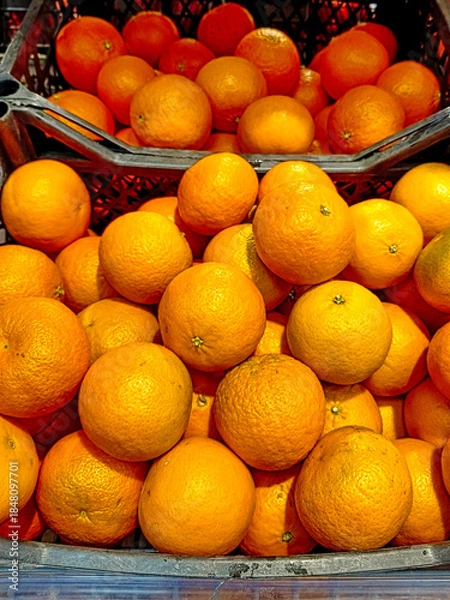 Obraz A crate full of oranges