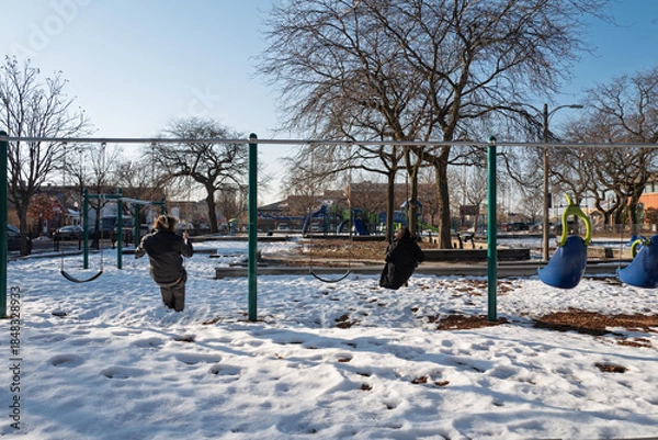 Obraz Couple on swing in winter