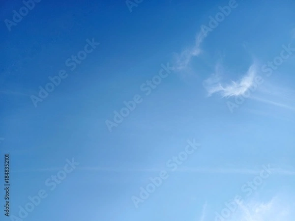 Obraz The sky is clear with a few clouds.