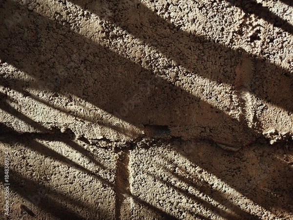 Obraz Light and shadow on the wall surface.