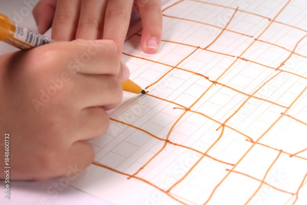 Obraz  線を描く子どもの手