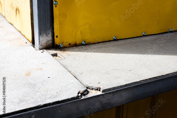Obraz Sunlight Casting Shadows On Steel Structure