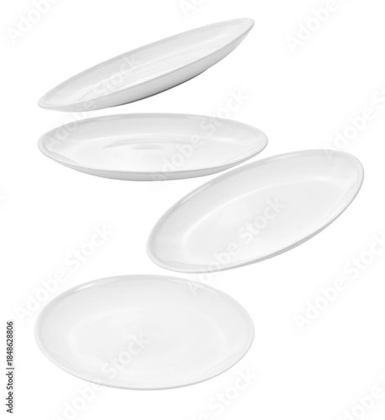 Obraz studio photograph capturing multiple white ceramic plates shown from various angles against a stark black backdrop emphasizing modern, minimalist design elements.