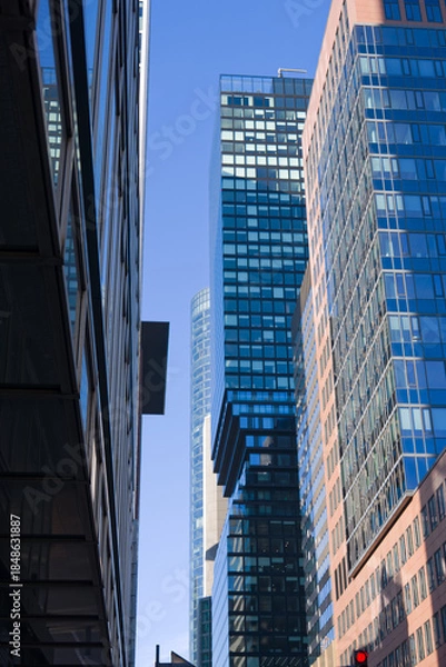 Obraz Looking up modern skyscrapers at financial district at German city of Frankfurt on a sunny autumn day. Photo taken November 22nd, 2025, Frankfurt am Main, Germany.