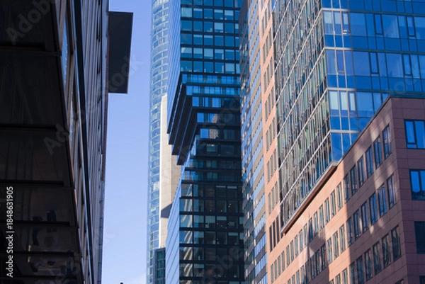 Obraz Looking up modern skyscrapers at financial district at German city of Frankfurt on a sunny autumn day. Photo taken November 22nd, 2025, Frankfurt am Main, Germany.