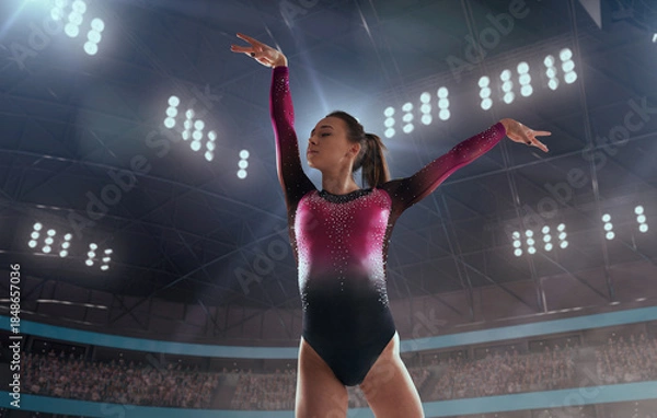 Fototapeta Female gymnast on professional gymnasts arena.