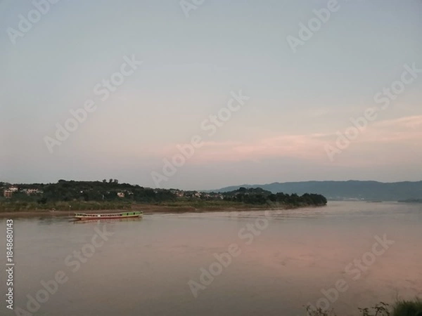 Obraz Mekhong river view with slow boat on background