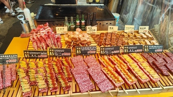 Obraz Luxury Japanese Street Food Stall with A5 Wagyu Beef and Seafood Skewers