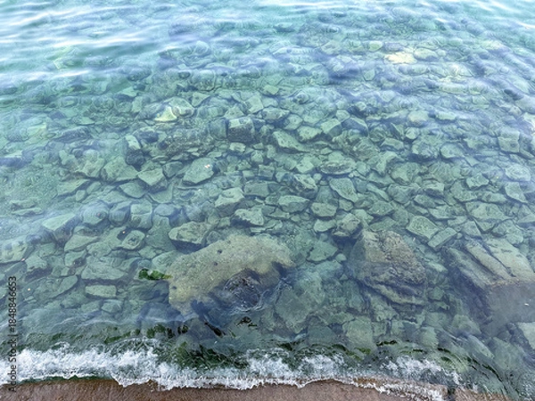 Obraz Clear Water Over Submerged Rocks