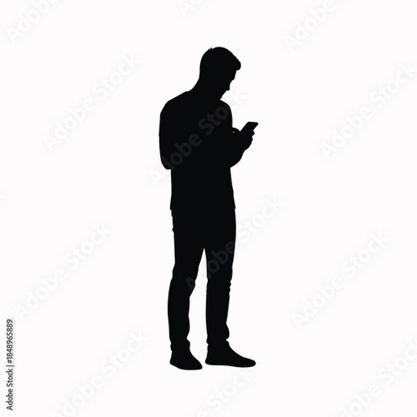 Obraz Man silhouette using mobile phone while standing