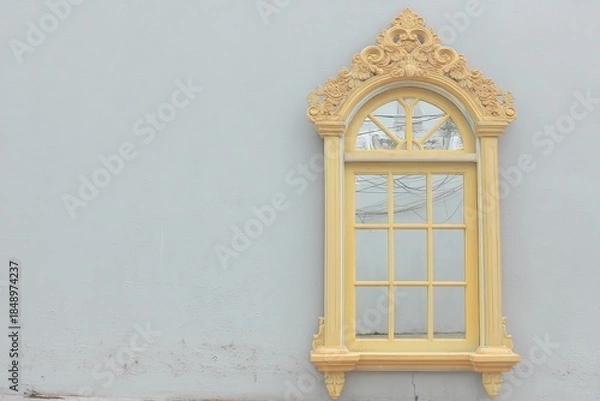 Obraz This golden window frame serves as a captivating architectural feature.