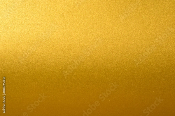 Obraz Details of golden texture background with gradient and shadow. Gold color paint wall. Luxury golden background and wallpaper. Gold foil or wrapping paper.