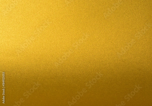 Obraz Details of golden texture background with gradient and shadow. Gold color paint wall. Luxury golden background and wallpaper. Gold foil or wrapping paper.
