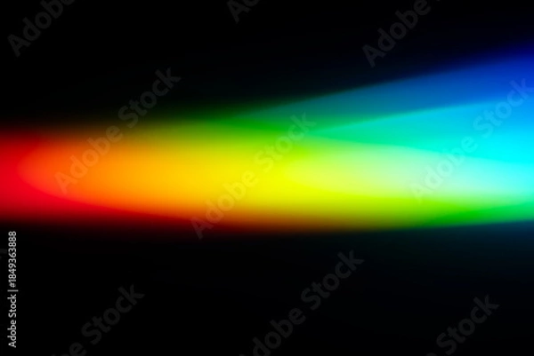 Obraz 黒背景に広がる虹色の光線スペクトルと七色グラデーション