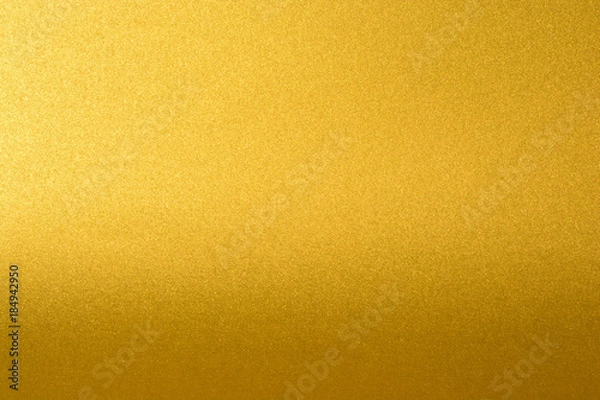 Fototapeta Details of golden texture background with gradient and shadow. Gold color paint wall. Luxury golden background and wallpaper. Gold foil or wrapping paper.