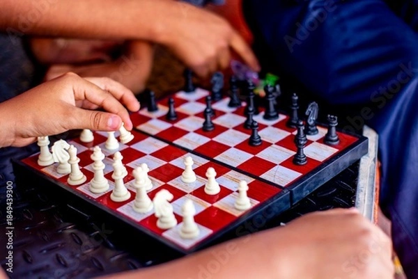 Obraz hand holding chess board