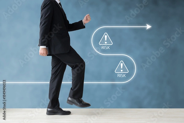 Obraz リスクを避けて歩みを進めるビジネスマン