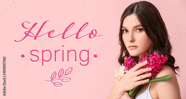 Obraz Beautiful young woman with hyacinth flowers on color background