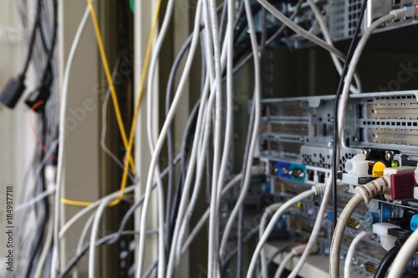 Fototapeta Patch Panel server rack with gray cords in the background