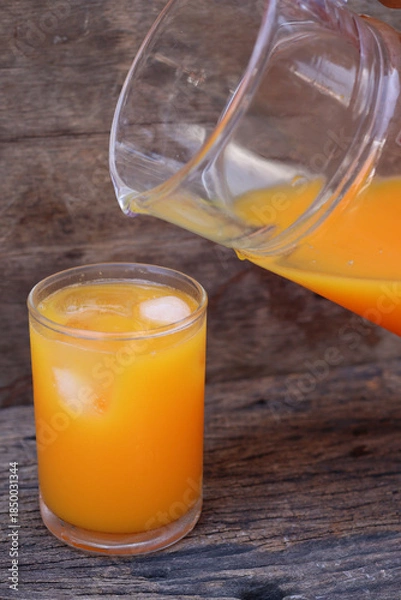 Obraz Soft drinks orange juice and iced in glass