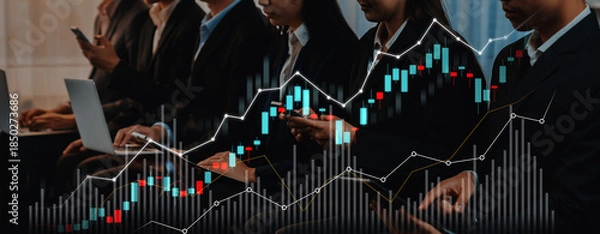 Fototapeta A group of business professionals in a modern workspace, engaging with tech devices. Abstract growth charts overlay symbolize dynamic finance and market analysis. Scalp
