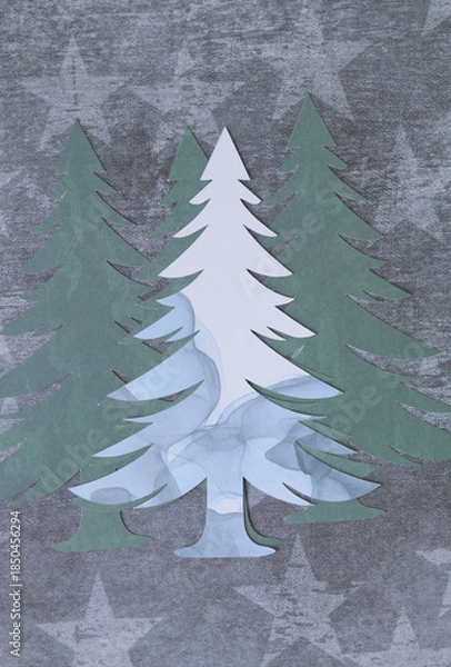 Obraz machine-cut paper trees on scrapbooking paper with stars