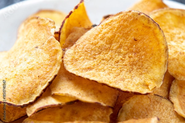 Obraz さつまいもチップスのアップ。