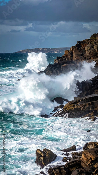 Obraz waves crashing on rocky coastline, 
