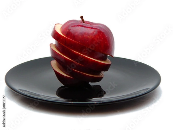 Fototapeta sliced apple on black plate too