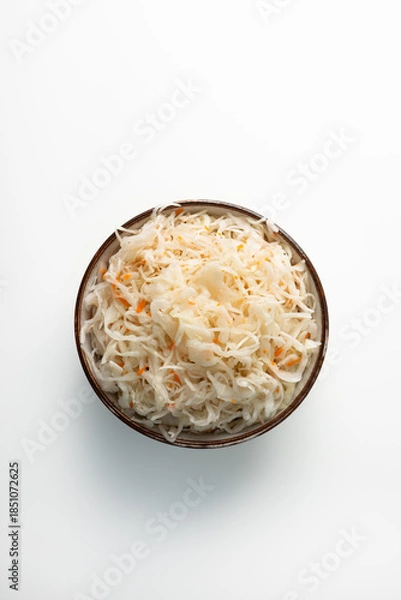 Obraz Top view of fermented cabbage in bowl healthy food close up
