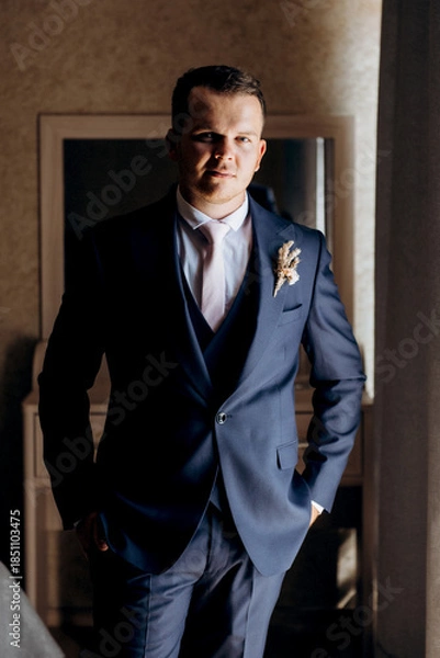 Obraz portrait of the groom of a man in the morning before the wedding