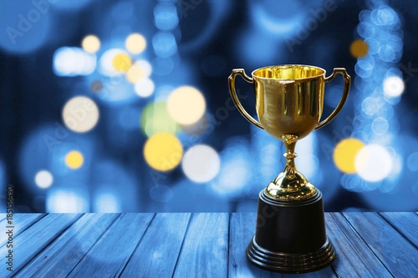 Obraz Chamption trophy on wood table , have space for idea.