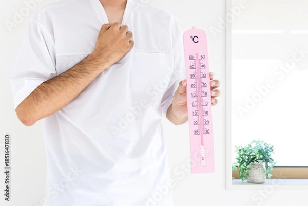 Obraz 大きな温度計を持つ男性（日本人、顔無し、30代）_夏
